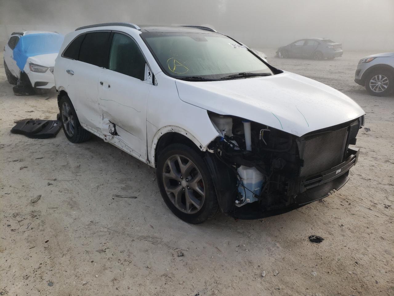 KIA SORENTO SX 2016 with VIN 5XYPK4A57GG040784 - Photo from auction