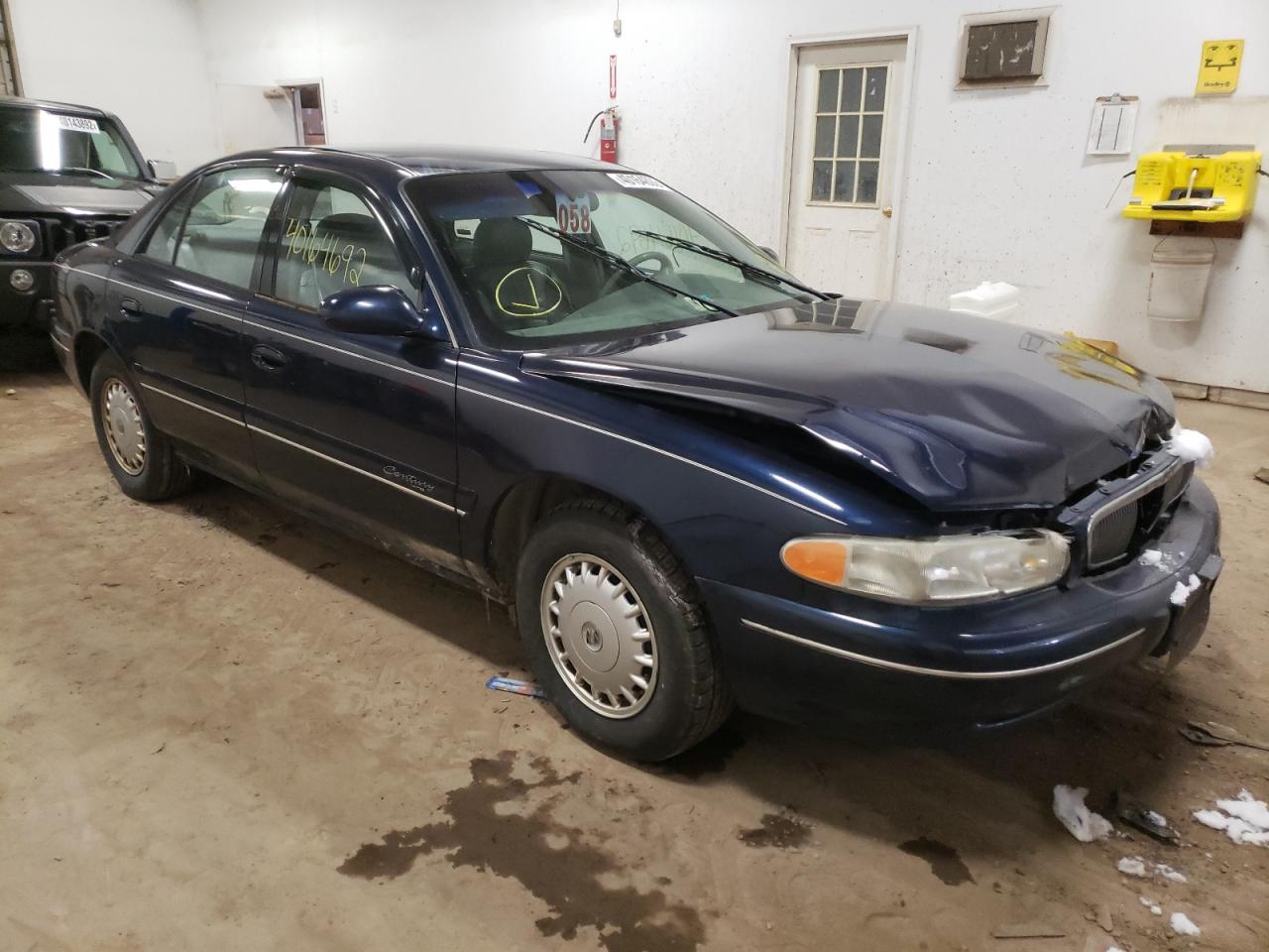BUICK CENTURY LI 2000 with VIN 2G4WY55J9Y1168328 - Photo from auction
