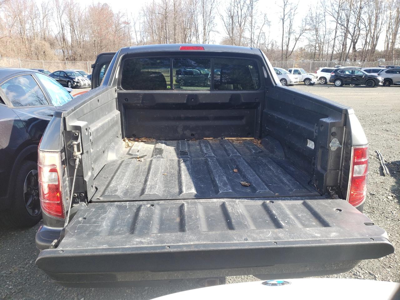 Photo 9 from auction – 2011 HONDA RIDGELINE with VIN 5FPYK1F50BB454993