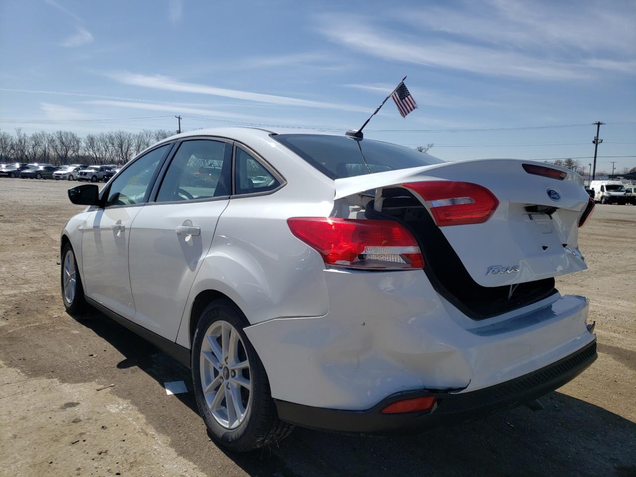 Foto 3 de la subasta – 2018 FORD FOCUS SE con VIN 1FADP3F23JL213036