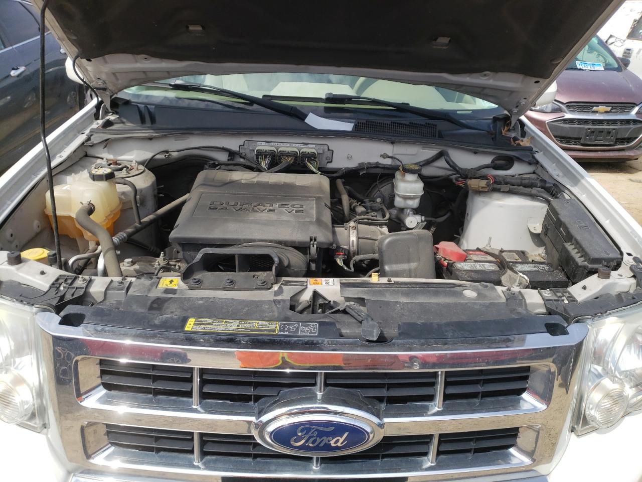 Photo 7 from auction – 2010 FORD ESCAPE LIM with VIN 1FMCU0EG4AKB52730