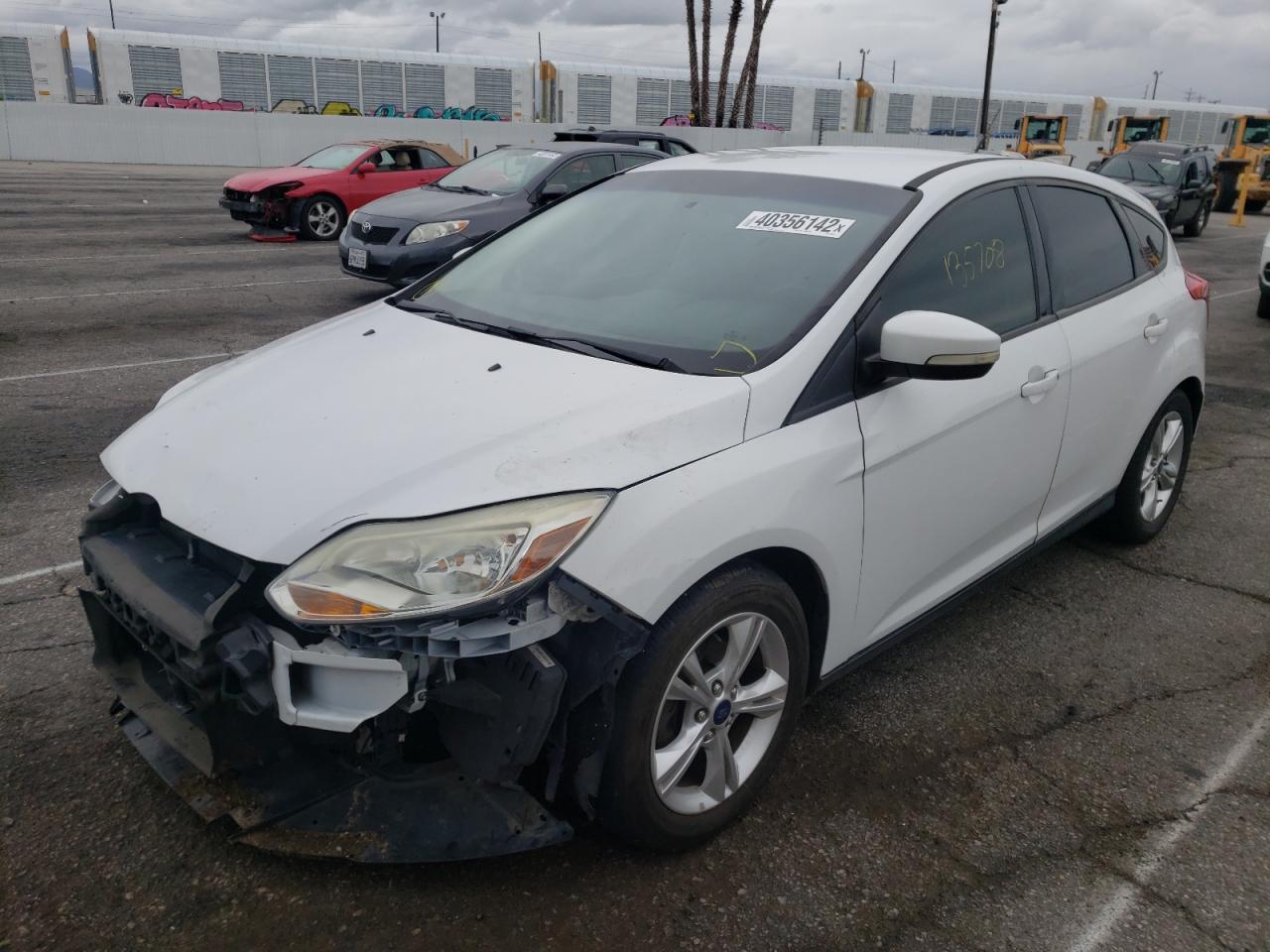 Photo 2 from auction – 2014 FORD FOCUS SE with VIN 1FADP3K23EL322916