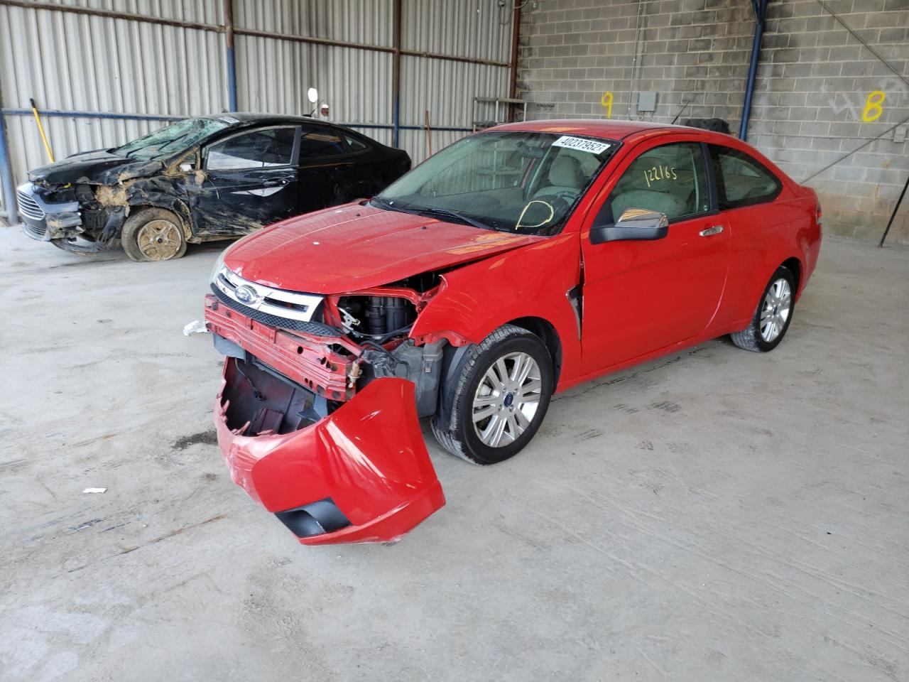Photo 2 from auction – 2008 FORD FOCUS with VIN 1FAHP33N68W106359