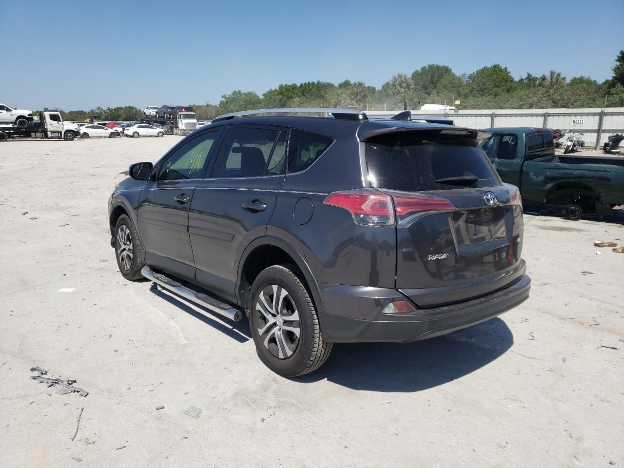 Photo 3 from auction – 2016 TOYOTA RAV4 LE with VIN JTMZFREV0GJ076126