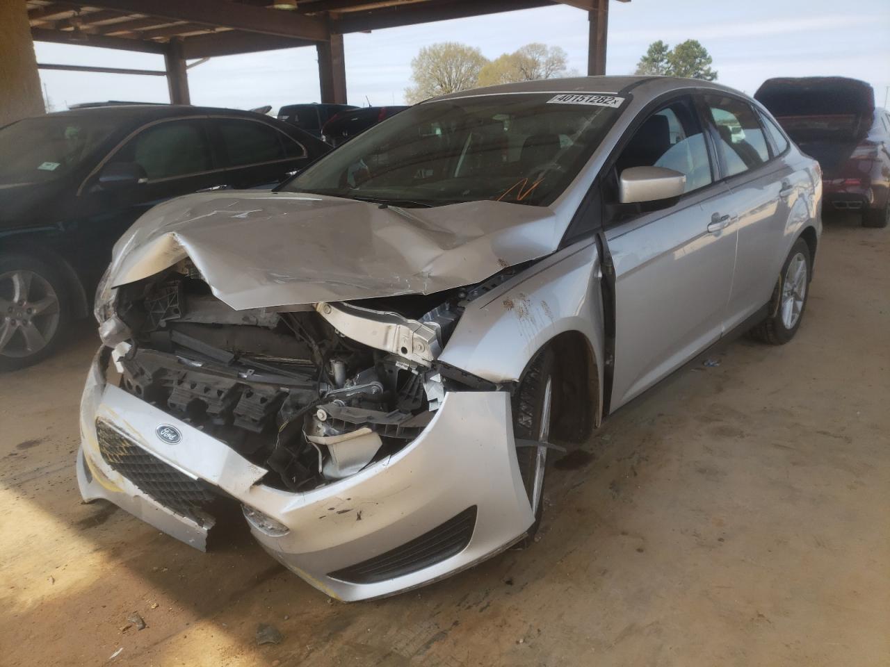 Photo 2 from auction – 2018 FORD FOCUS SE with VIN 1FADP3F2XJL328247