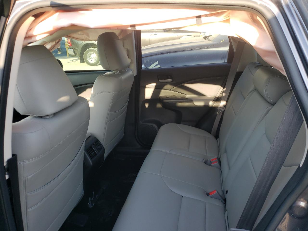 Photo 6 from auction – 2016 HONDA CR-V SE with VIN 2HKRM3H47GH514218