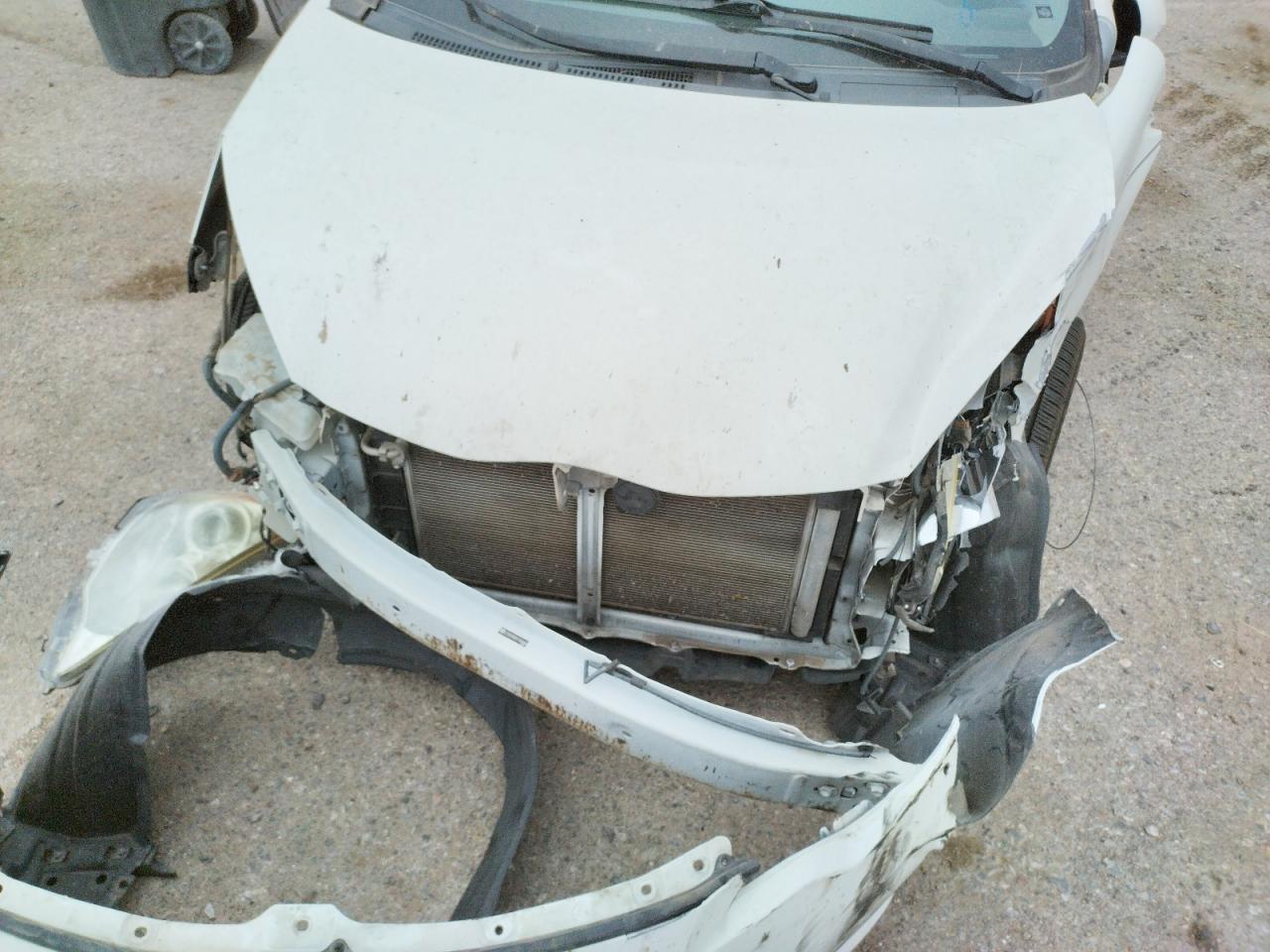 Photo 9 from auction – 2012 TOYOTA PRIUS C with VIN JTDKDTB3XC1500686