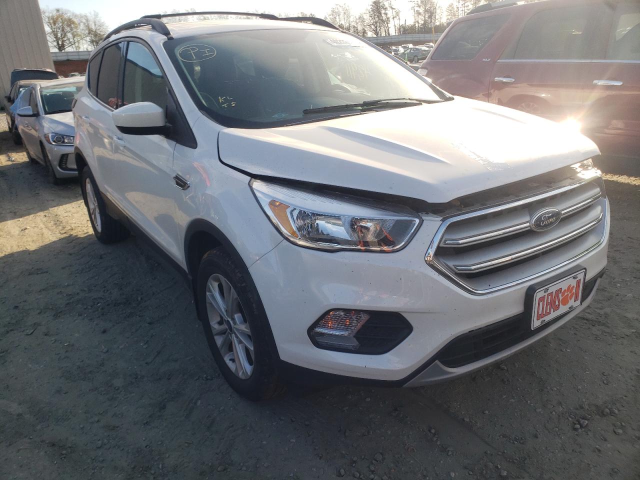 FORD ESCAPE SE 2018 with VIN 1FMCU9GD5JUC26975 - Photo from auction