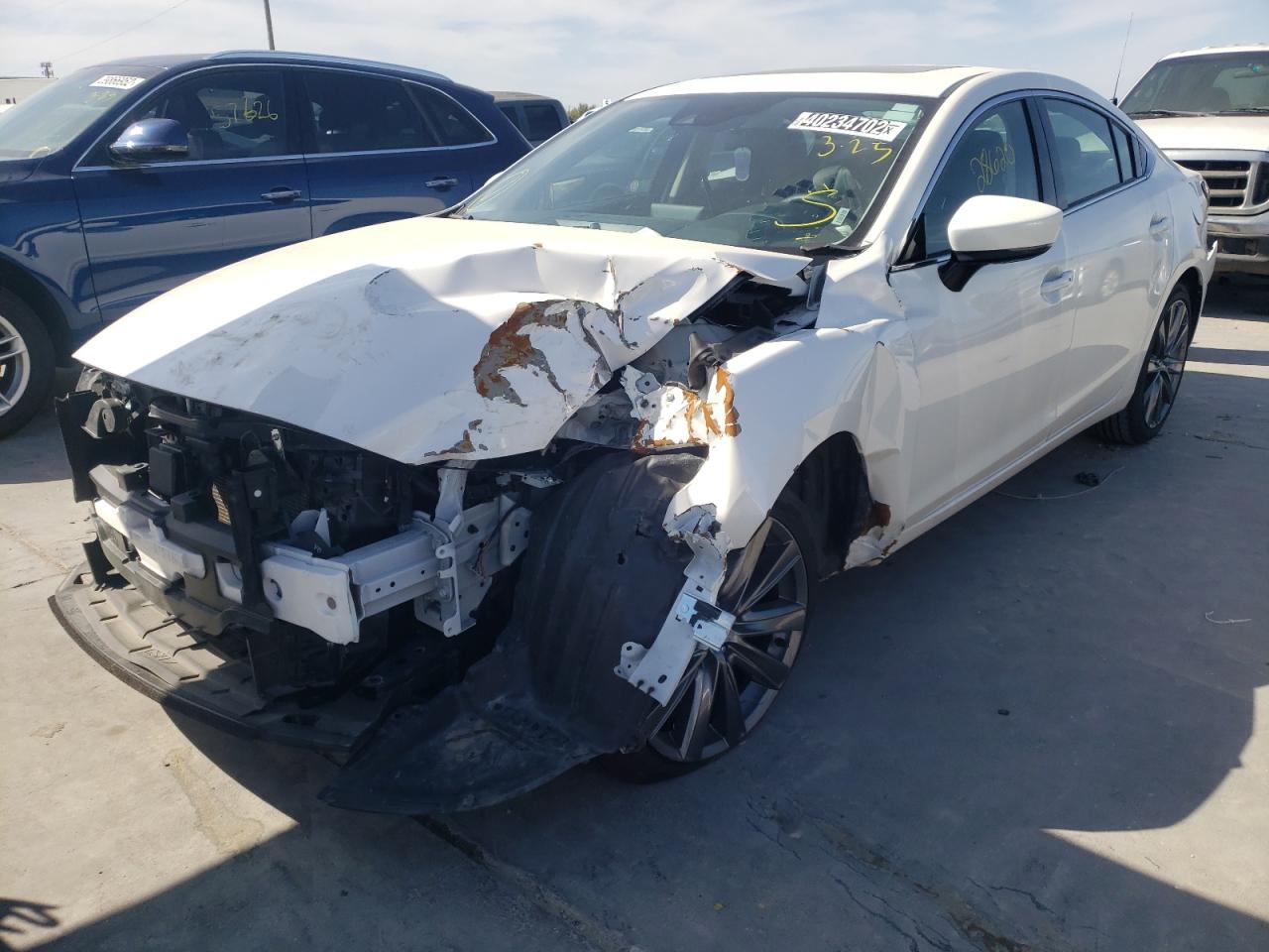 Photo 2 from auction – 2021 MAZDA 6 TOURING with VIN JM1GL1VM1M1612019