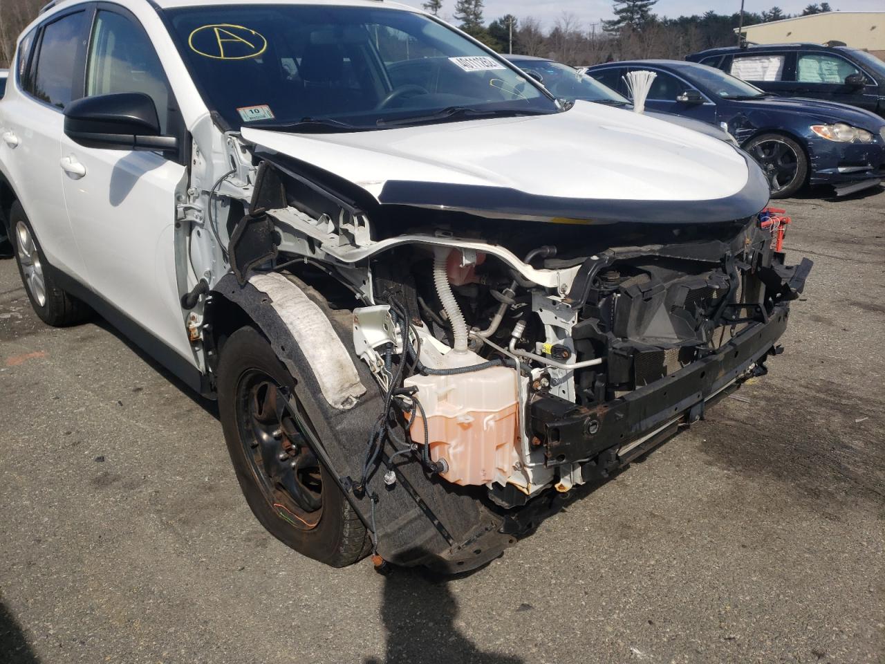 Photo 9 from auction – 2014 TOYOTA RAV4 LE with VIN JTMBFREV2ED047255