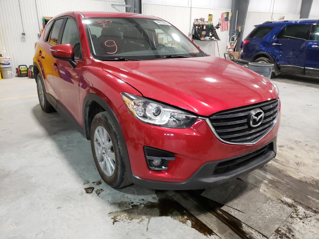 MAZDA CX-5 TOURI 2016 with VIN JM3KE4CY2G0890618 - Photo from auction