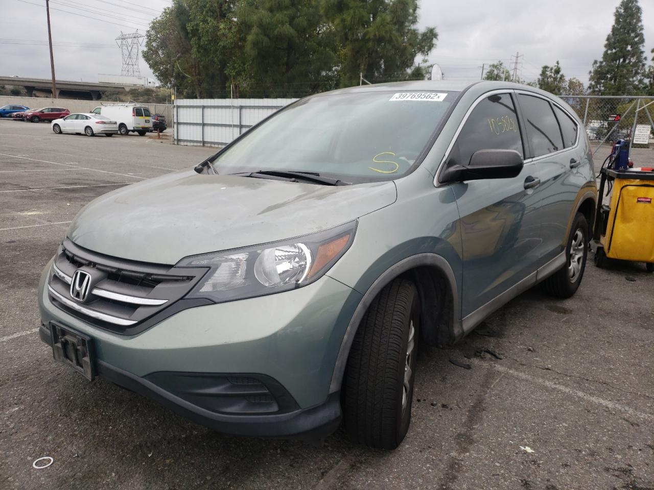 Photo 2 from auction – 2012 HONDA CR-V LX with VIN 2HKRM3H3XCH502159