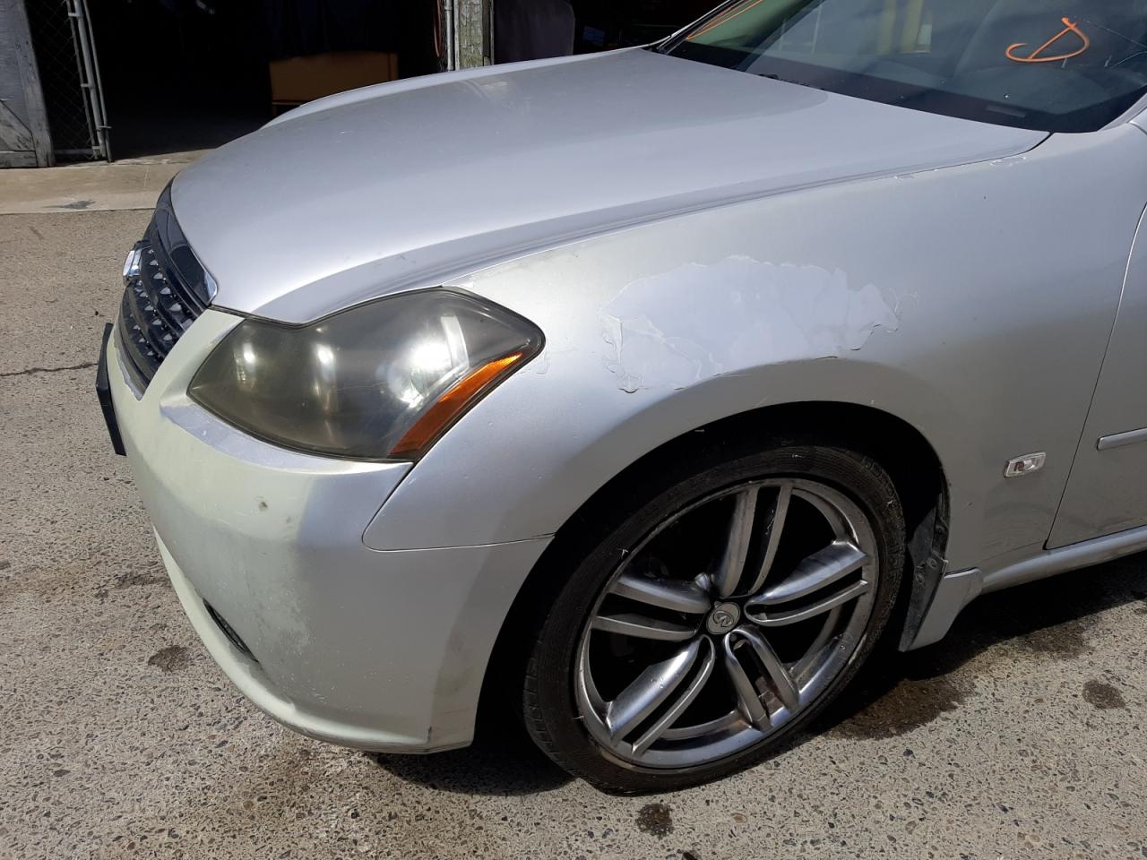 Photo 9 from auction – 2006 INFINITI M45 BASE with VIN JNKBY01E46M202755