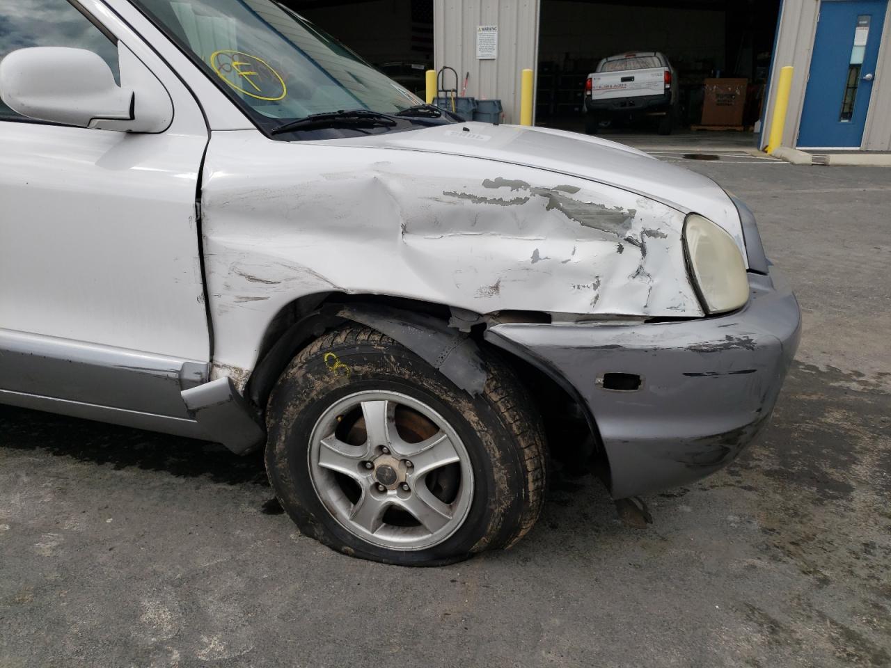Photo 9 from auction – 2003 HYUNDAI SANTA FE with VIN KM8SC73E83U500299