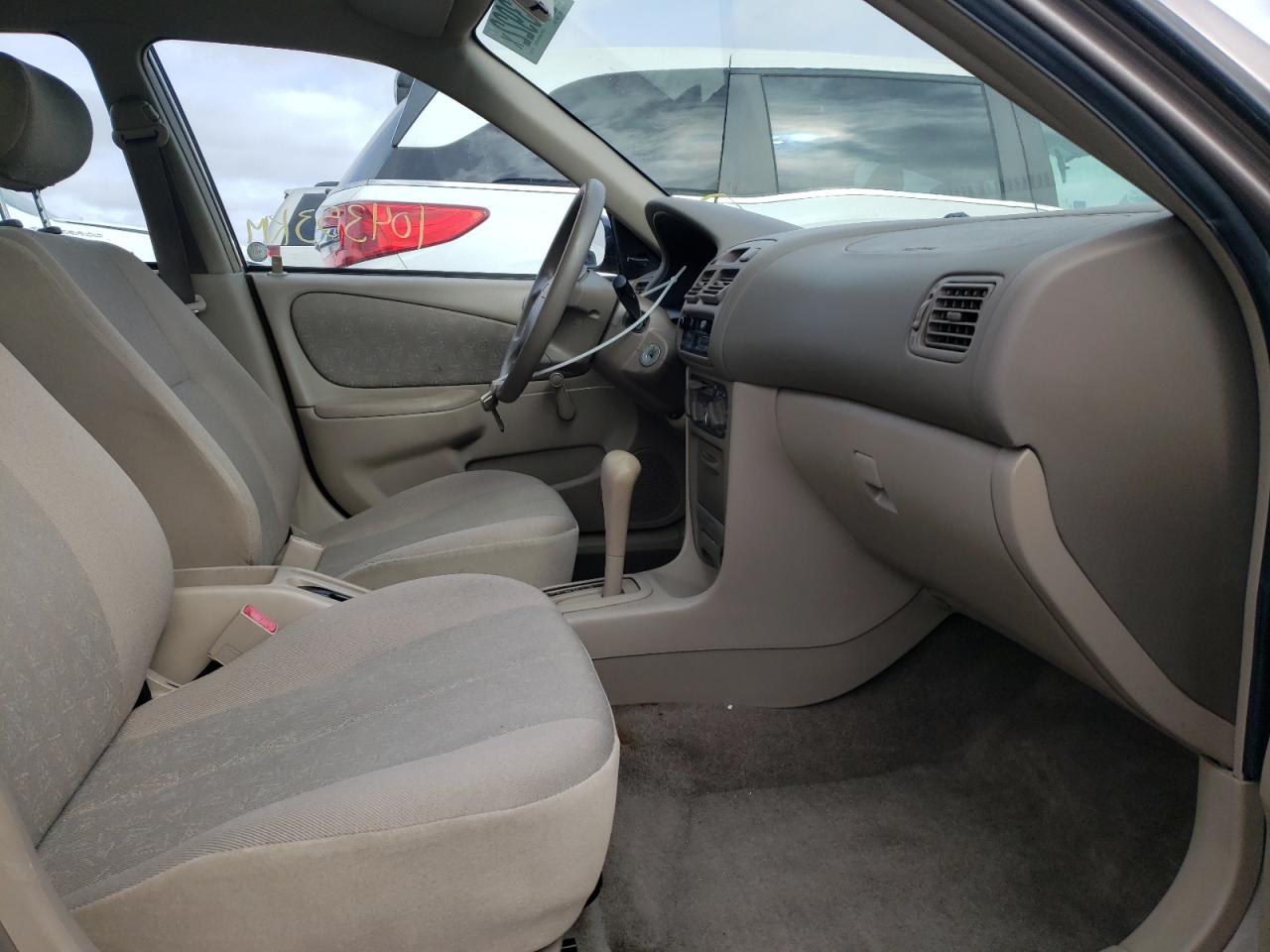 Photo 5 from auction – 1999 TOYOTA COROLLA VE with VIN 2T1BR12E2XC756930