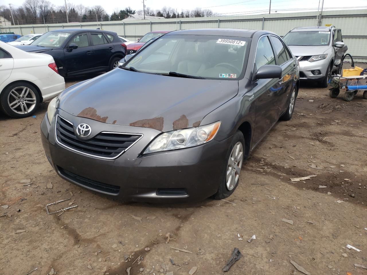 Photo 2 from auction – 2007 TOYOTA CAMRY HYBR with VIN JTNBB46K573015178