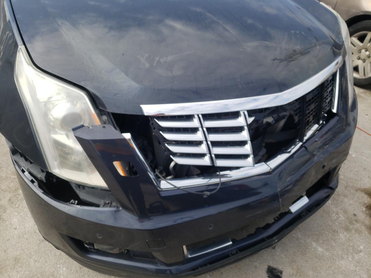 Photo 9 from auction – 2014 CADILLAC SRX PERFOR with VIN 3GYFNCE32ES543974