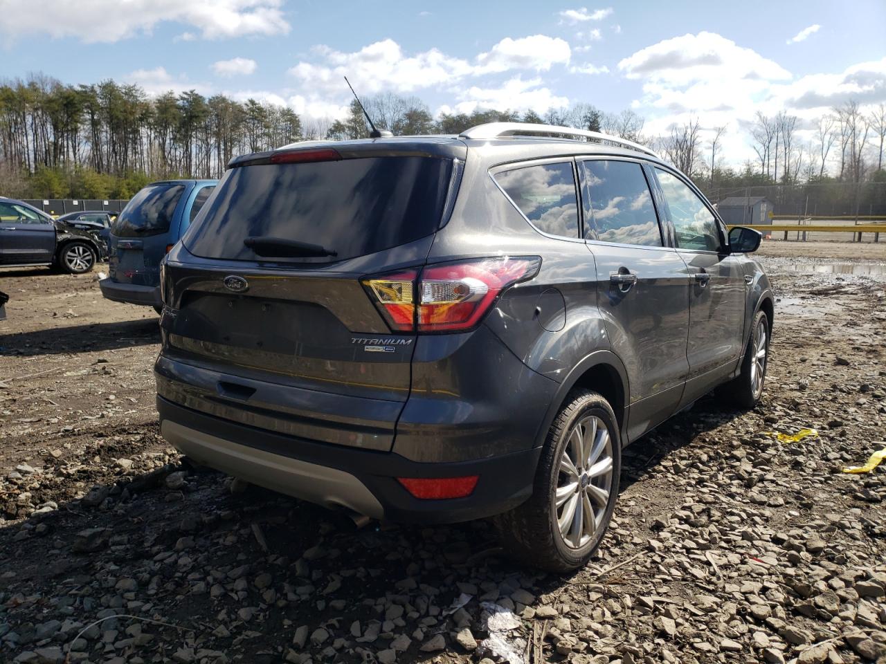 Photo 4 from auction – 2017 FORD ESCAPE TIT with VIN 1FMCU9J95HUD56835