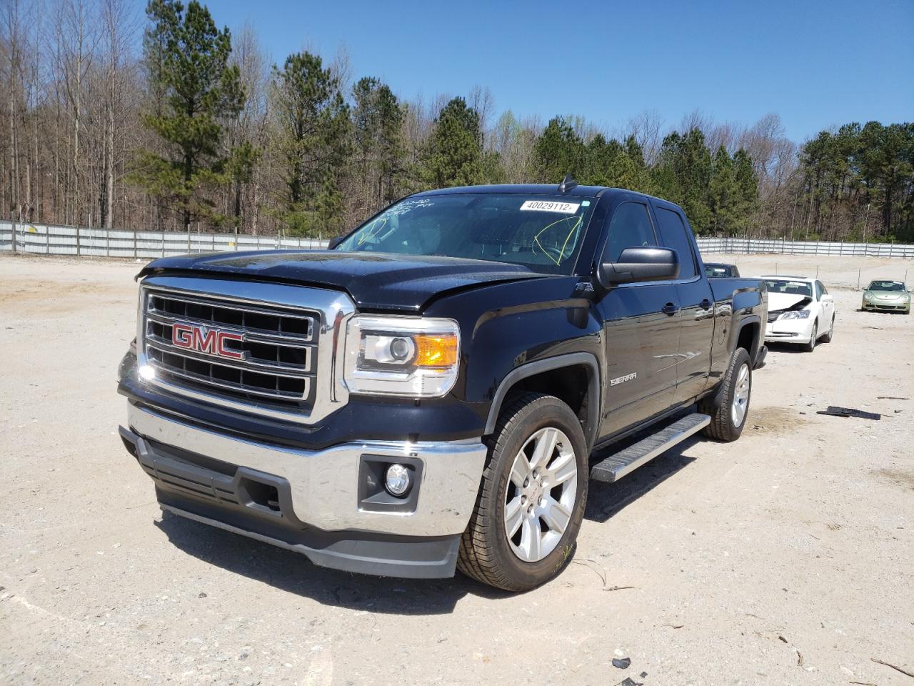 Photo 2 from auction – 2015 GMC SIERRA K15 with VIN 1GTV2UEC4FZ170408