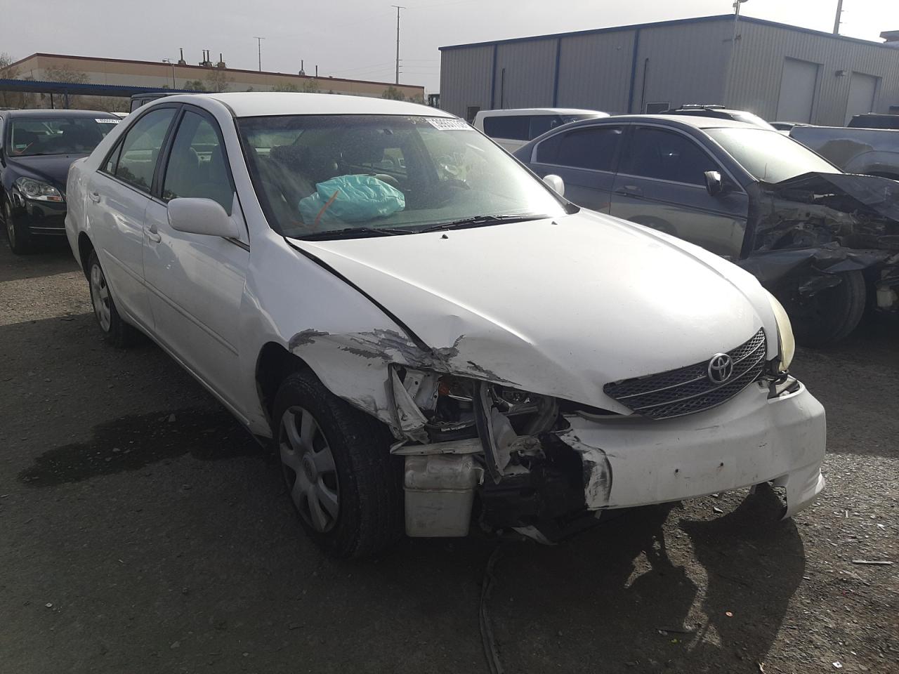 TOYOTA CAMRY LE 2003 with VIN 4T1BE32K33U253428 - Photo from auction