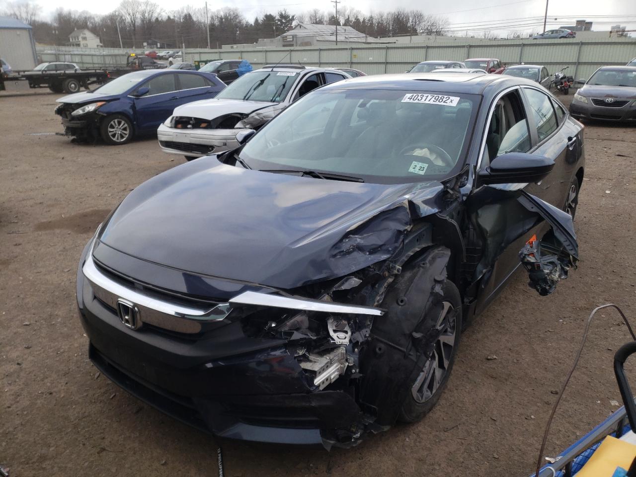 Photo 2 from auction – 2018 HONDA CIVIC EX with VIN 2HGFC2F75JH531114