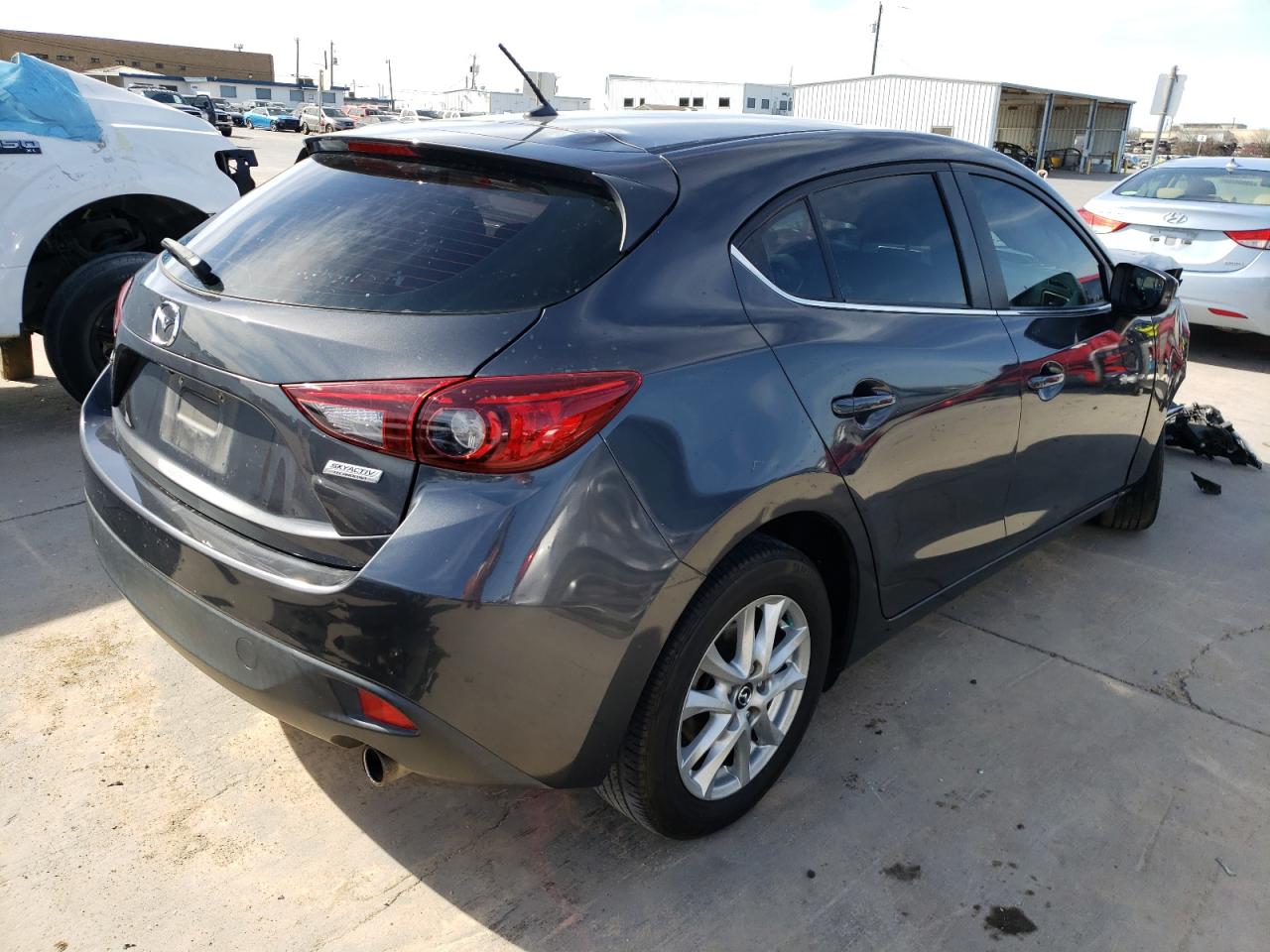 Photo 4 from auction – 2015 MAZDA 3 TOURING with VIN 3MZBM1L74FM130569