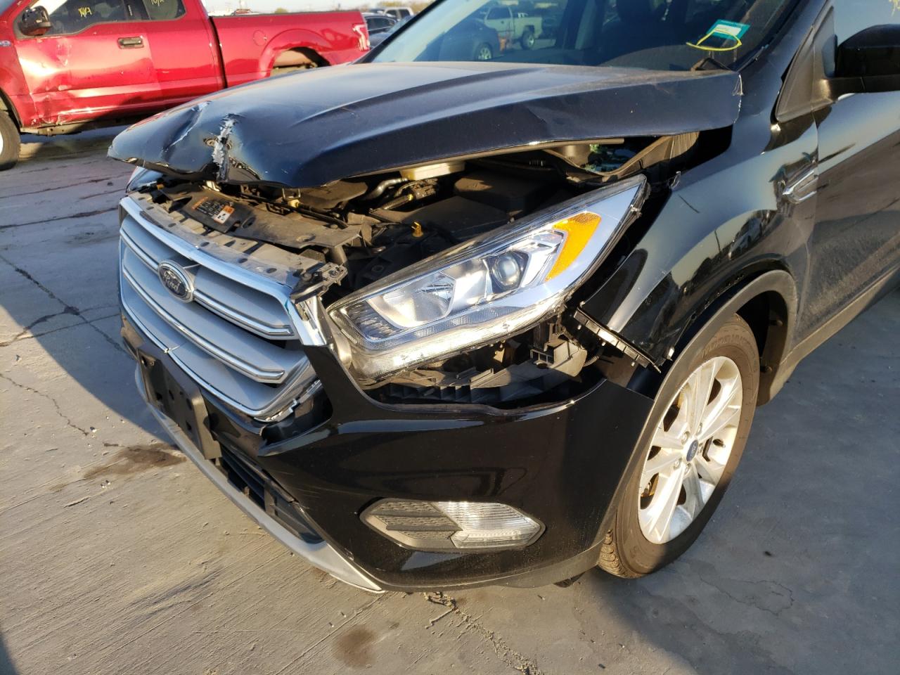 Photo 9 from auction – 2018 FORD ESCAPE SEL with VIN 1FMCU0HD7JUA71209