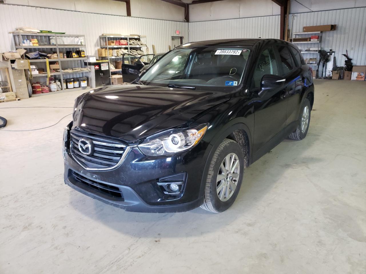 Photo 2 from auction – 2016 MAZDA CX-5 TOURI with VIN JM3KE4CYXG0794512