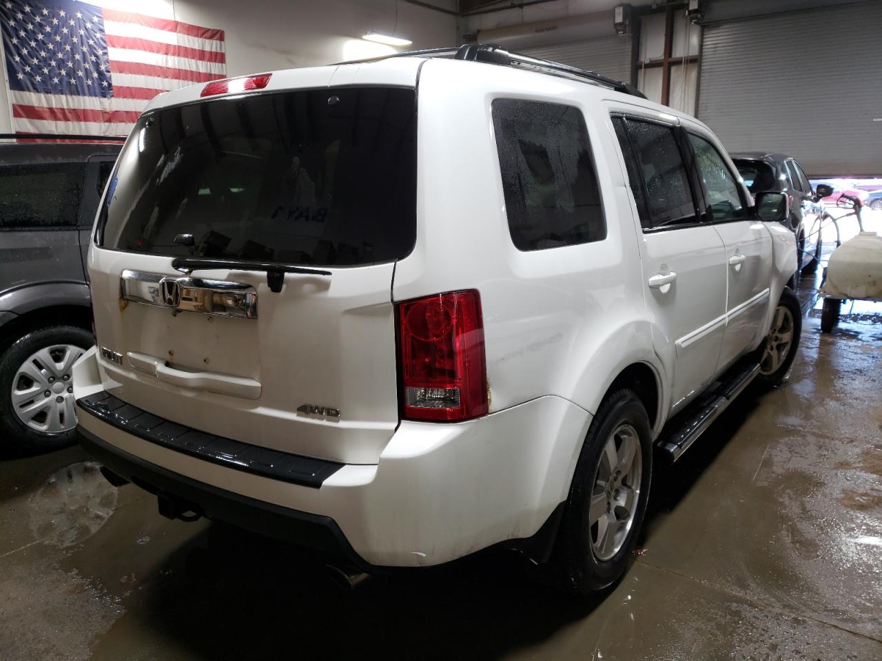 Photo 4 from auction – 2011 HONDA PILOT EXL with VIN 5FNYF4H55BB043990