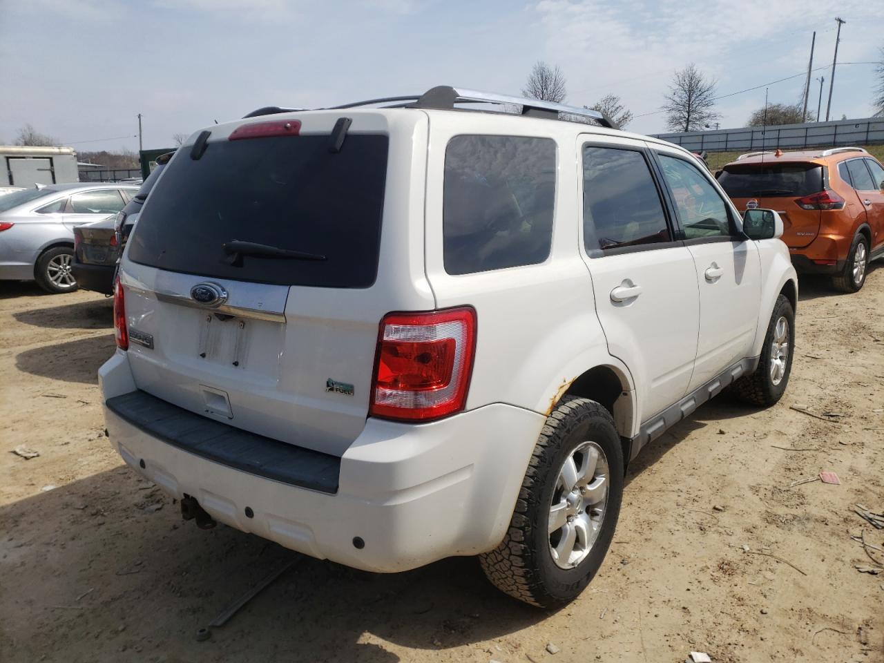 Photo 4 from auction – 2010 FORD ESCAPE LIM with VIN 1FMCU0EG4AKB52730
