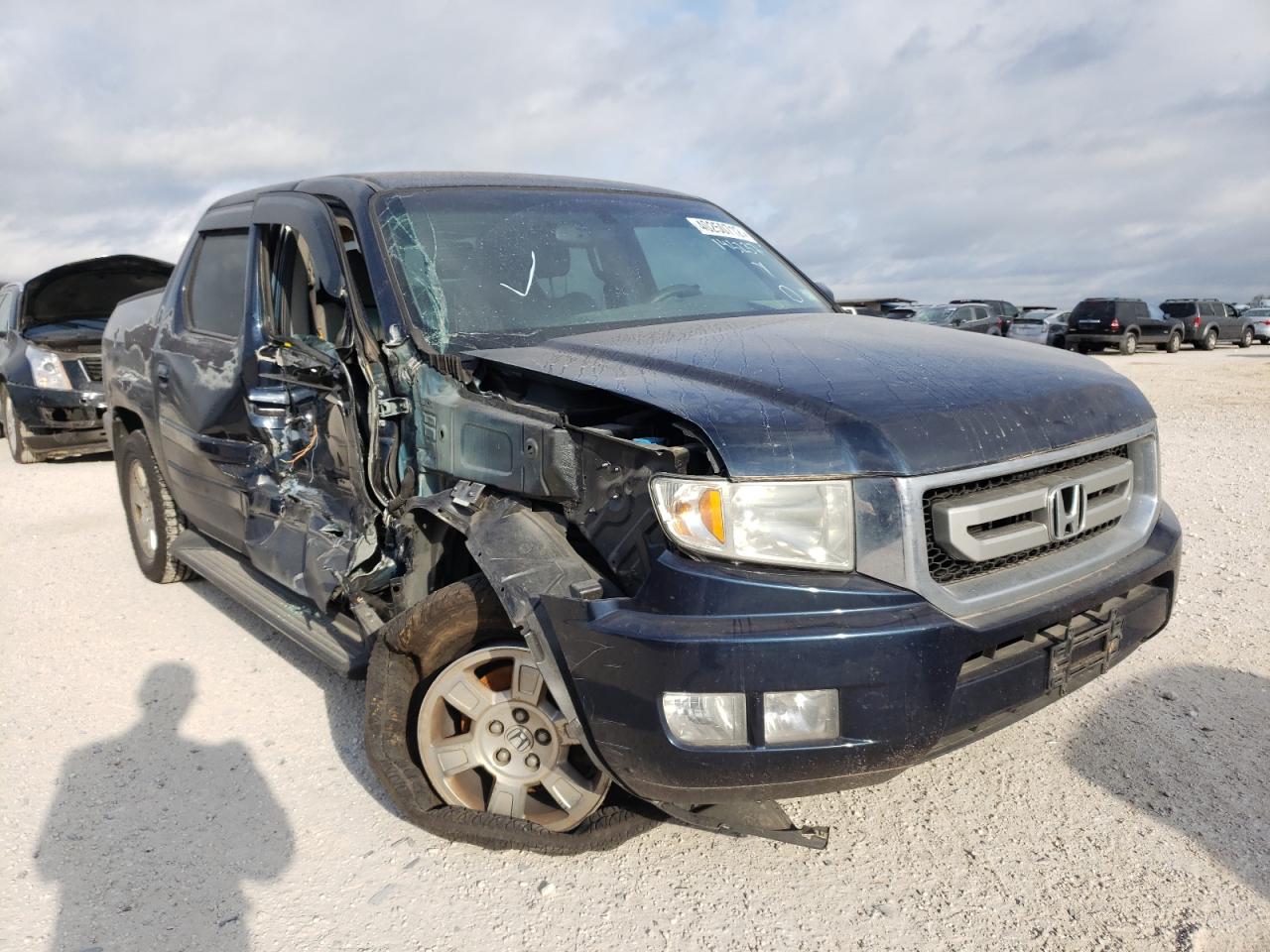 HONDA RIDGELINE 2009 with VIN 2HJYK16409H501746 - Photo from auction
