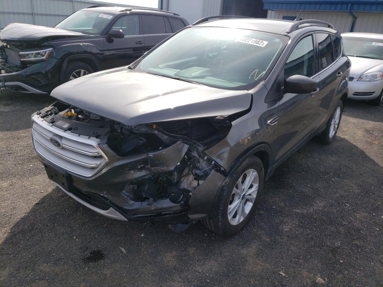 Photo 2 from auction – 2018 FORD ESCAPE SE with VIN 1FMCU9GD1JUA80638