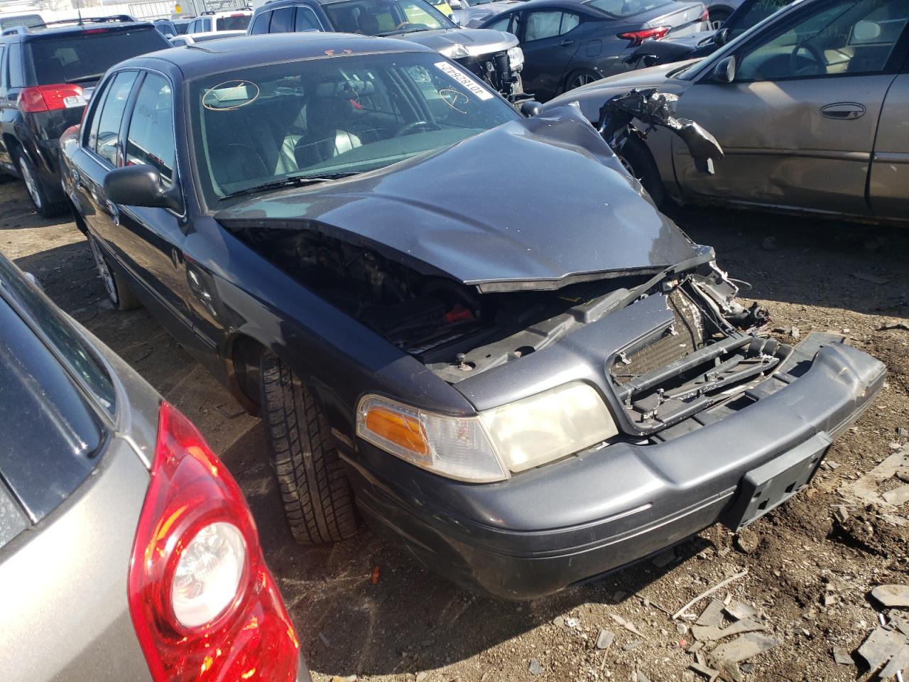 FORD CROWN VICT 2004 with VIN 2FDFP74W54X160467 - Photo from auction
