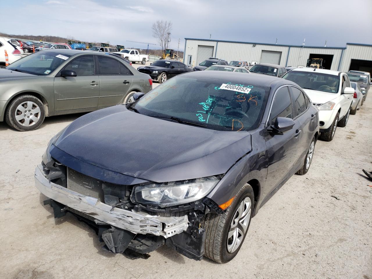 Photo 2 from auction – 2018 HONDA CIVIC LX with VIN 19XFC2F56JE028121