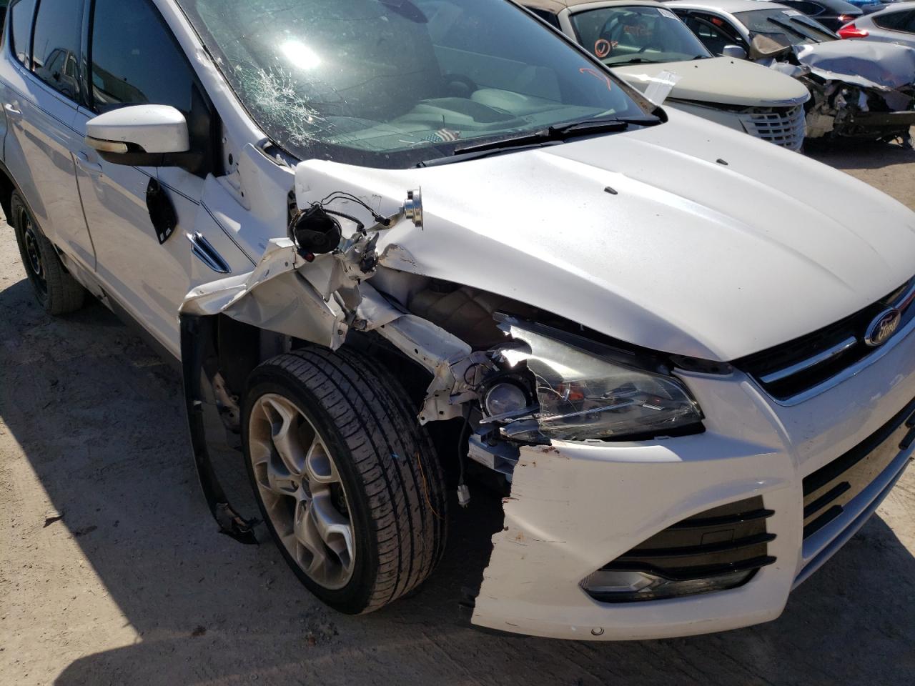 Photo 9 from auction – 2013 FORD ESCAPE TIT with VIN 1FMCU0J96DUD15412
