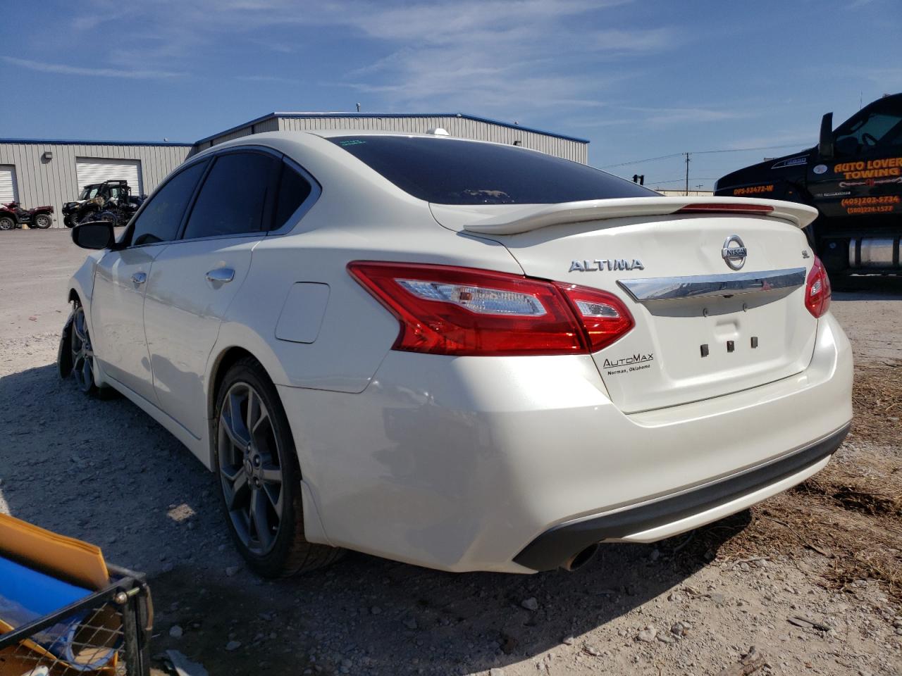 Photo 3 from auction – 2016 NISSAN ALTIMA 2.5 with VIN 1N4AL3AP5GC293434