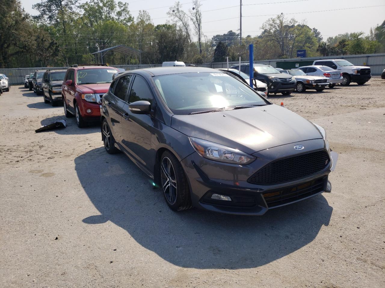 FORD FOCUS ST 2018 with VIN 1FADP3L95JL275569 - Photo from auction