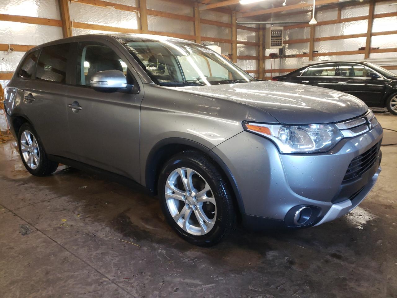 MITSUBISHI OUTLANDER 2015 with VIN JA4AD3A34FZ011861 - Photo from auction