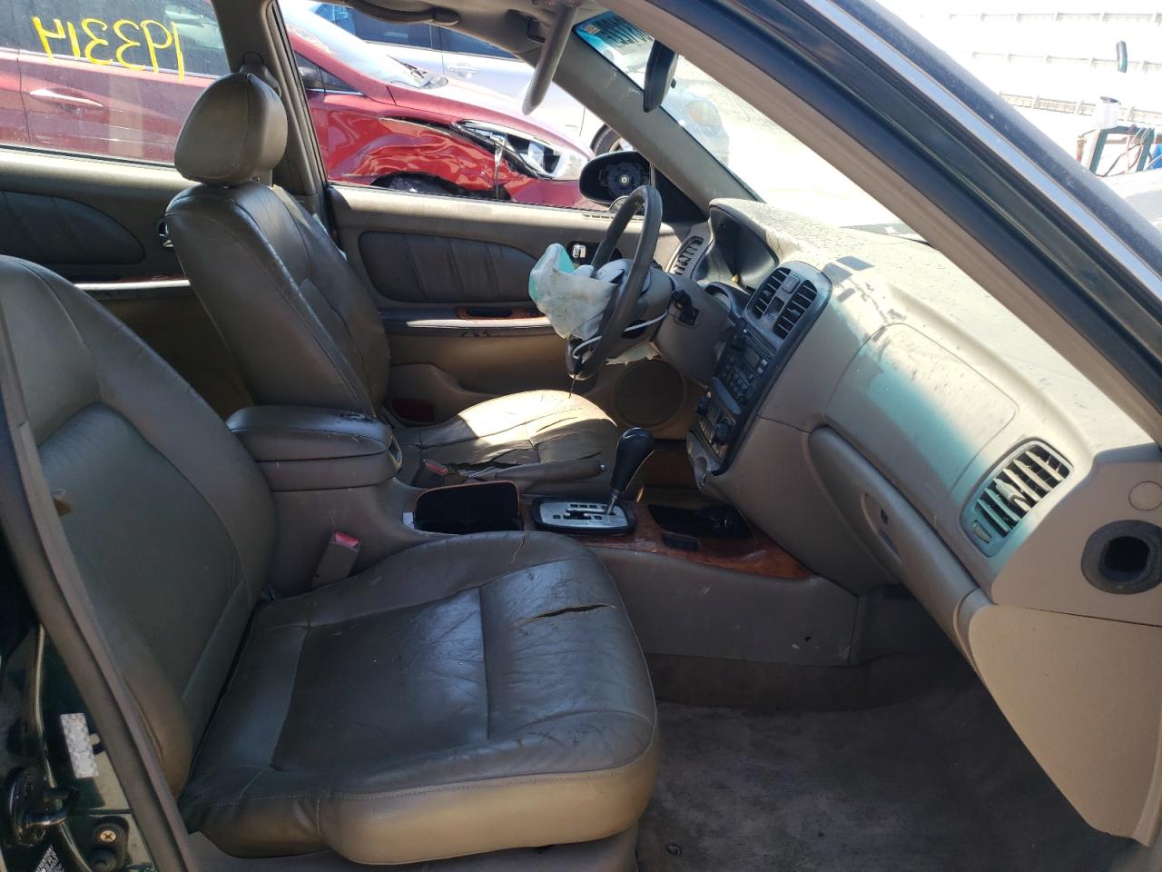 Photo 5 from auction – 2002 KIA OPTIMA MAG with VIN KNAGD128525118575