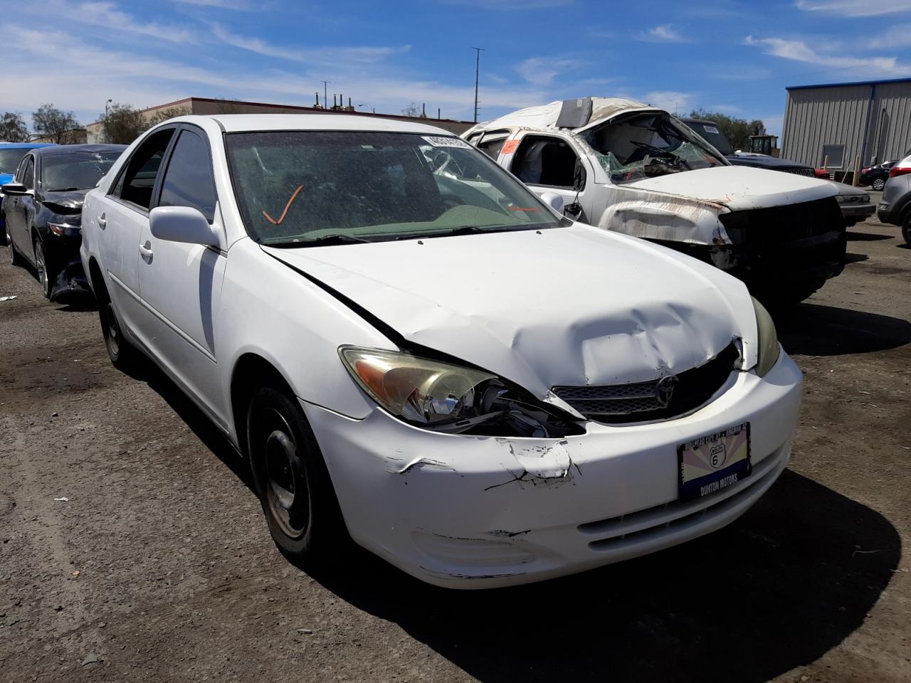 TOYOTA CAMRY LE 2004 with VIN 4T1BE30KX4U359279 - Photo from auction