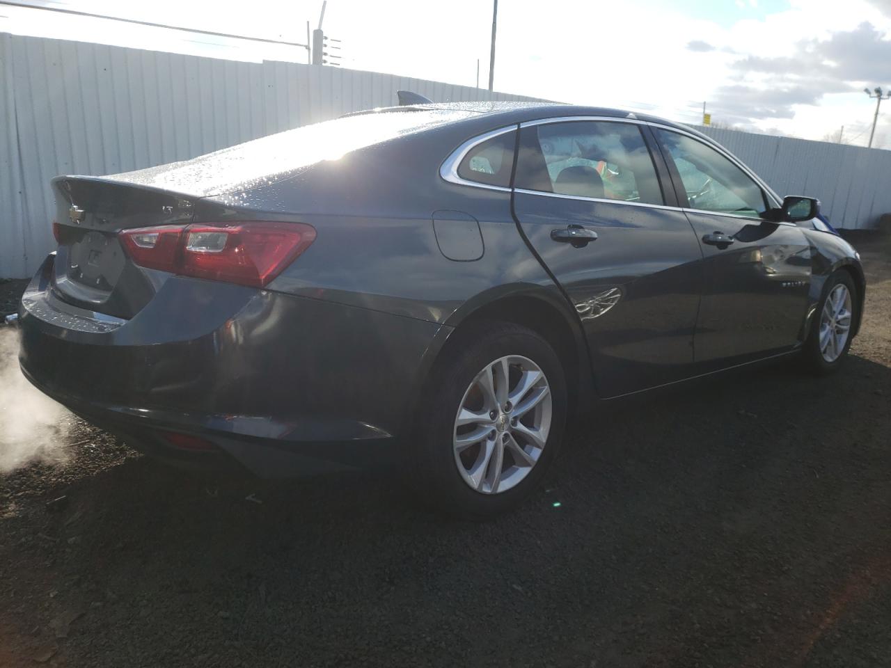 Photo 4 from auction – 2018 CHEVROLET MALIBU LT with VIN 1G1ZD5ST4JF114977