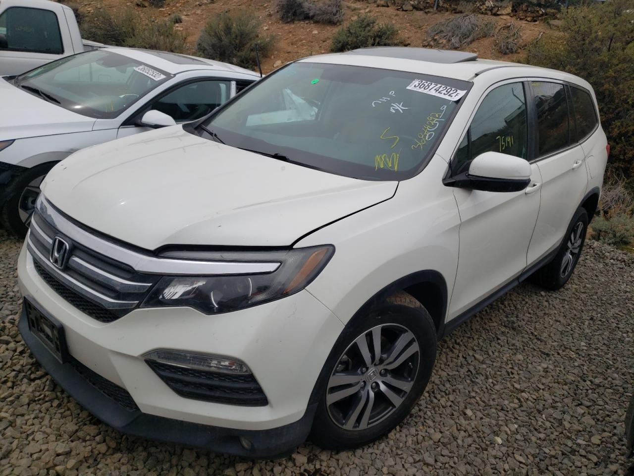 Photo 2 from auction – 2016 HONDA PILOT EXLN with VIN 5FNYF5H73GB049950
