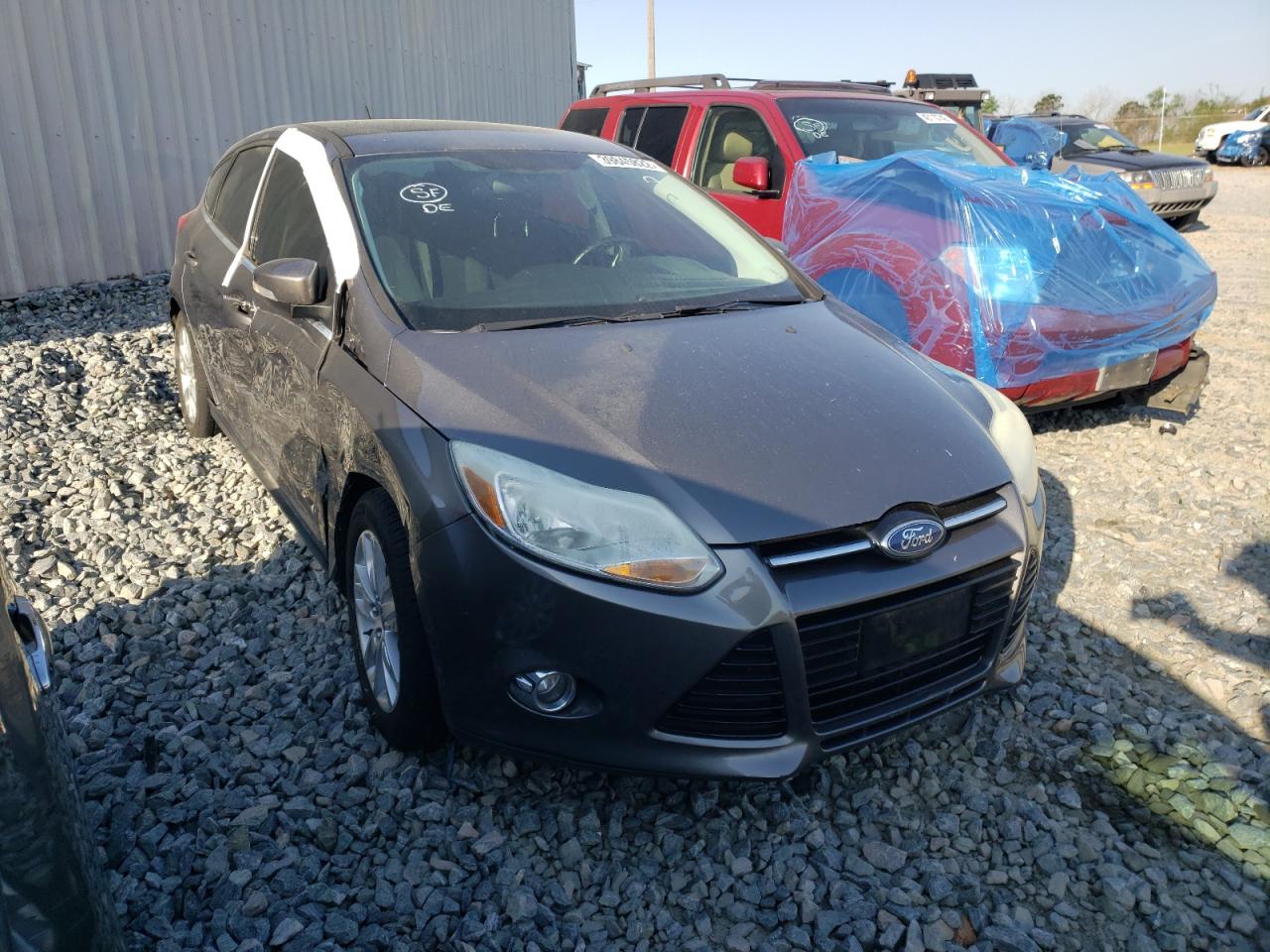 FORD FOCUS SEL 2012 with VIN 1FAHP3M2XCL358601 - Photo from auction