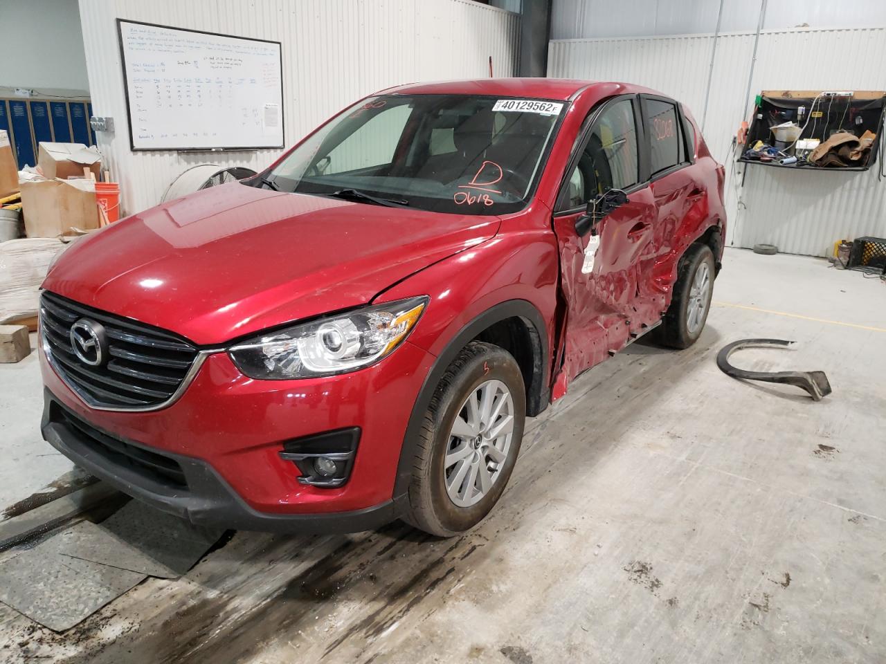 Photo 2 from auction – 2016 MAZDA CX-5 TOURI with VIN JM3KE4CY2G0890618