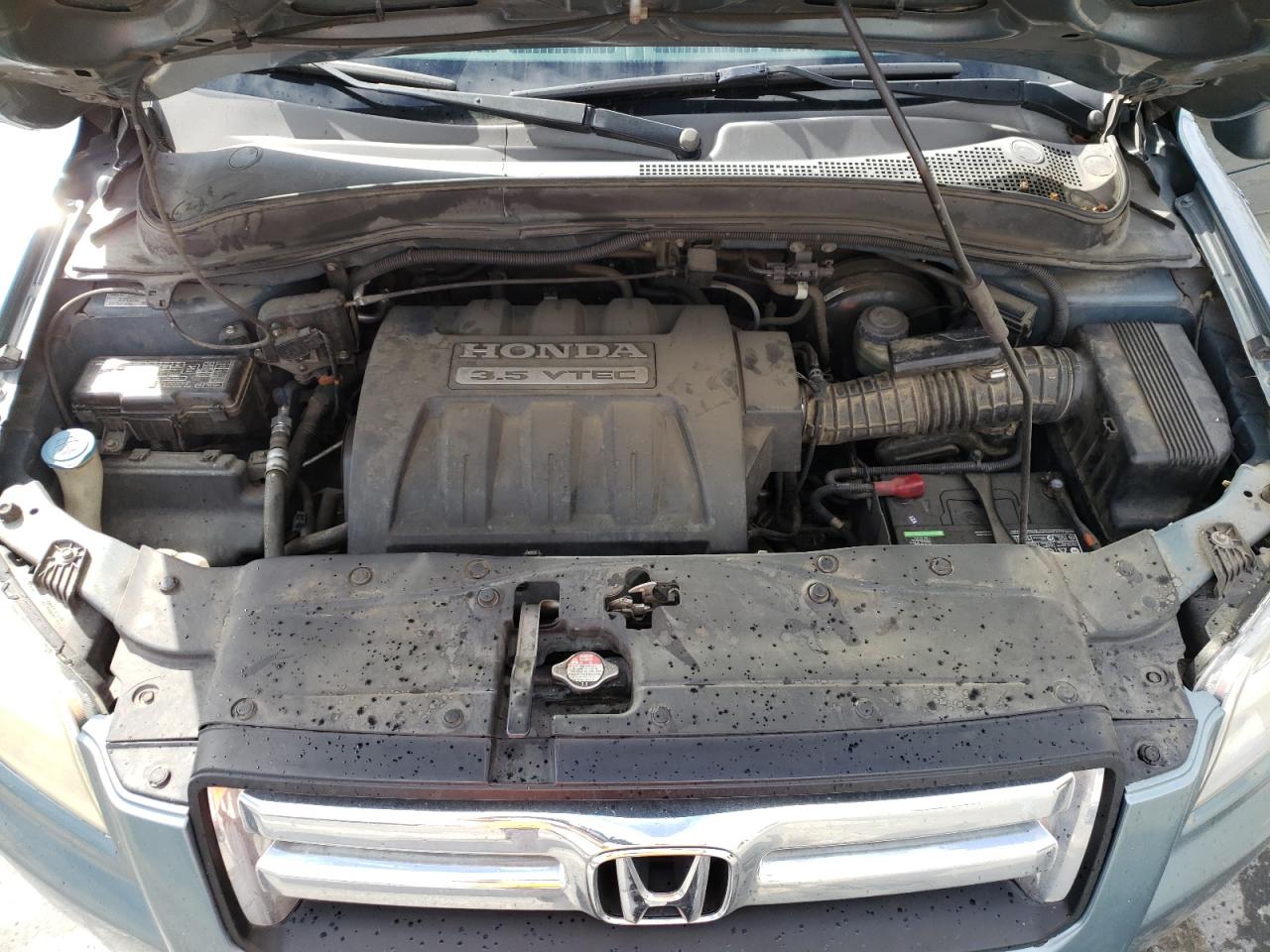 Photo 7 from auction – 2006 HONDA PILOT EX with VIN 2HKYF18616H530490