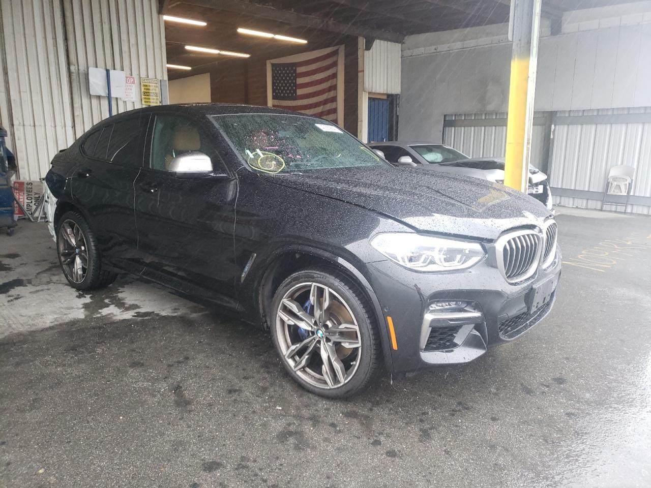 BMW X4 XDRIVEM 2020 with VIN 5UX2V5C06L9B57892 - Photo from auction