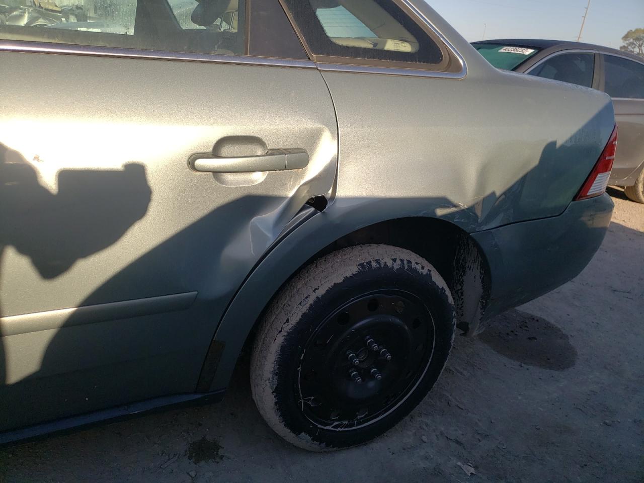 Photo 9 from auction – 2005 MERCURY MONTEGO LU with VIN 1MEHM40195G620947