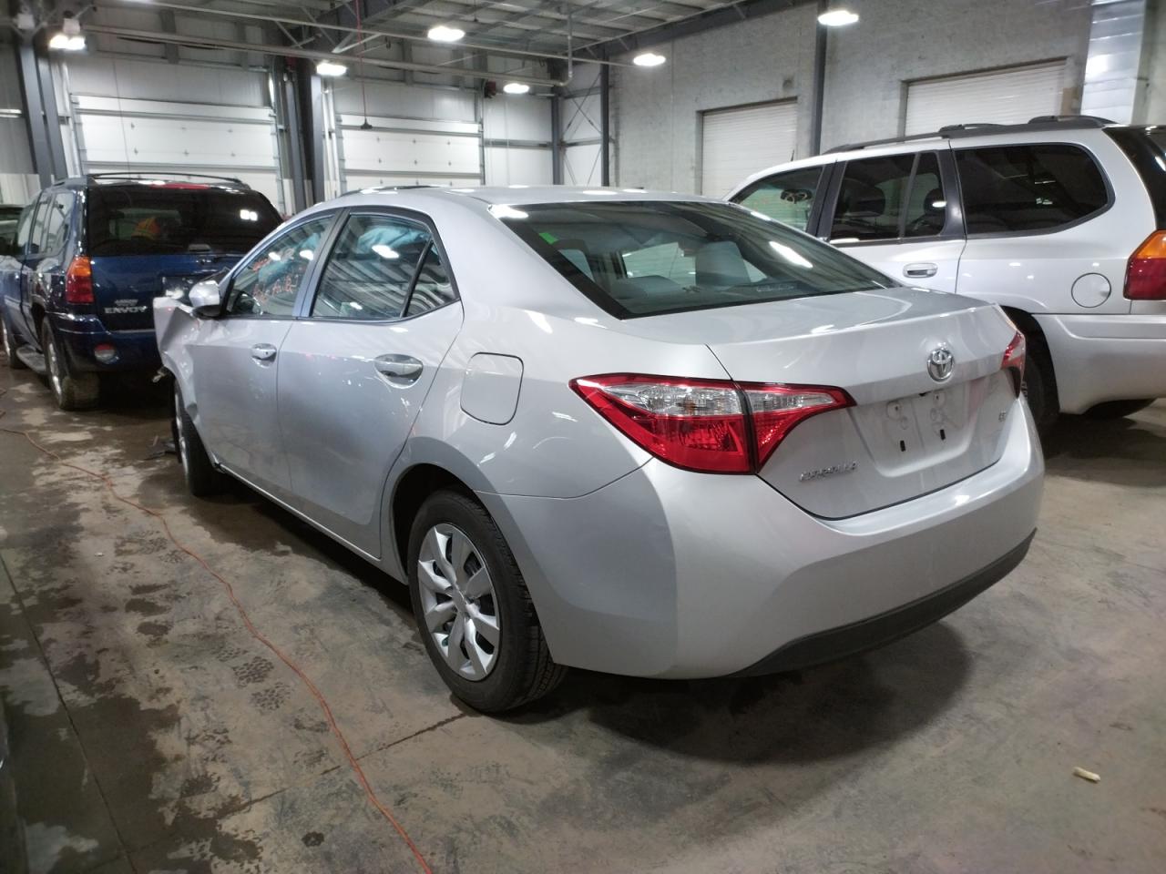 Photo 3 from auction – 2014 TOYOTA COROLLA L with VIN 2T1BURHE1EC228457