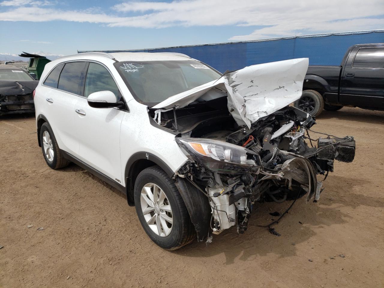 KIA SORENTO LX 2017 with VIN 5XYPGDA32HG335860 - Photo from auction