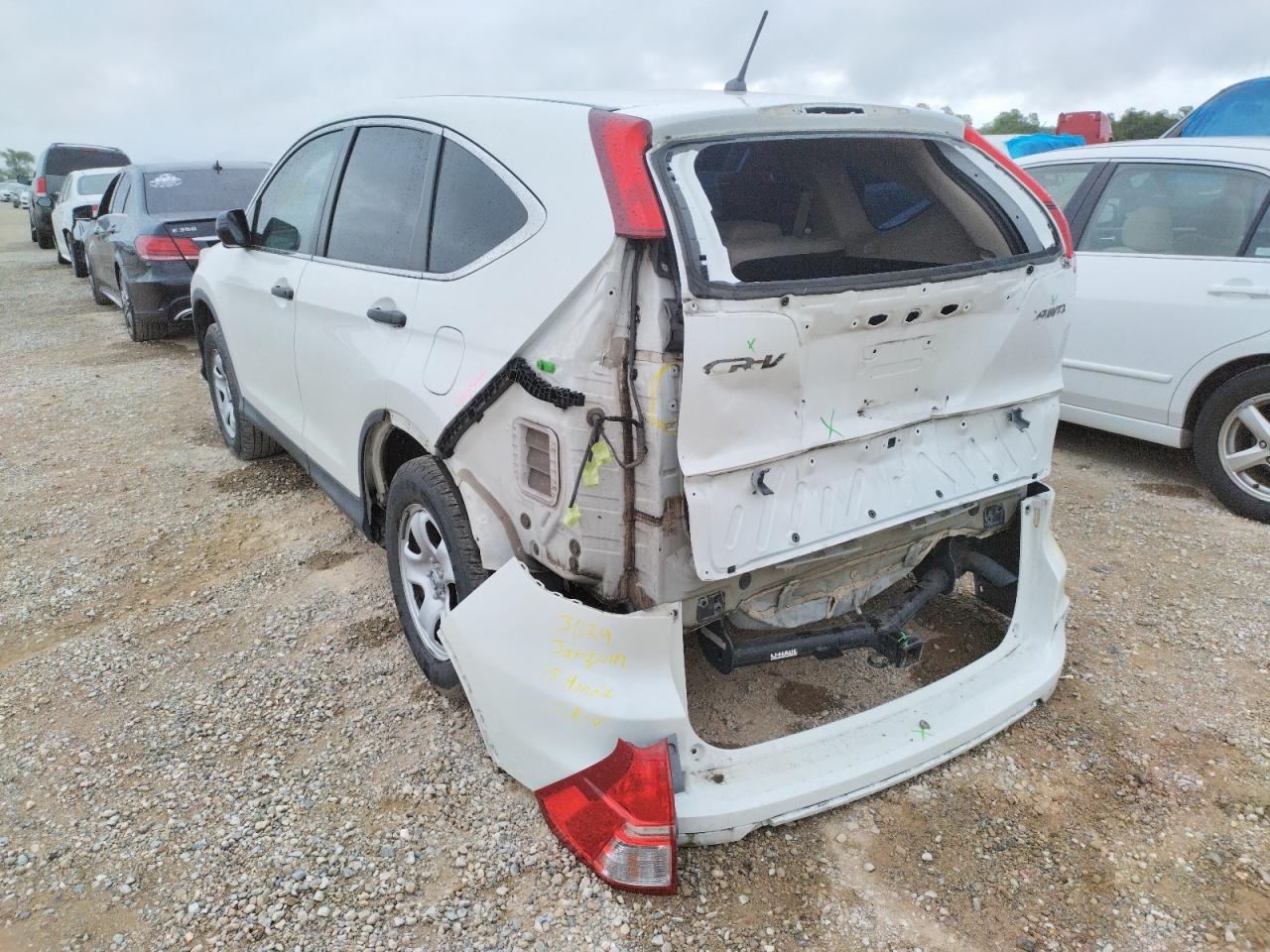 Photo 3 from auction – 2015 HONDA CR-V LX with VIN 5J6RM4H36FL016691